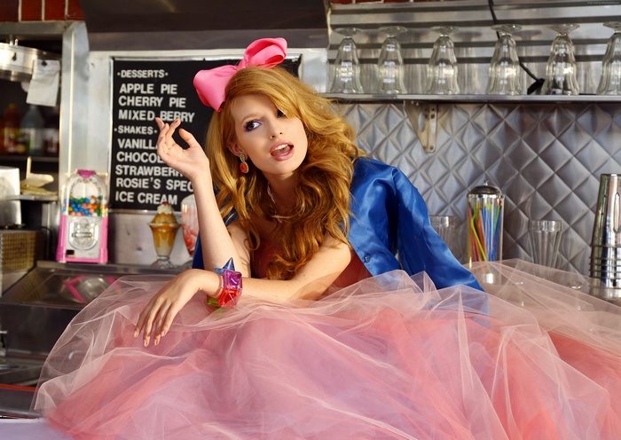 Bella Thorne in a diner setting