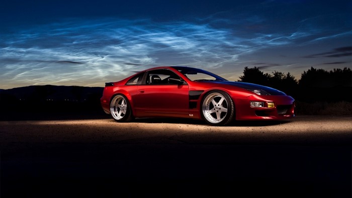 Red Nissan 300ZX sports car at night