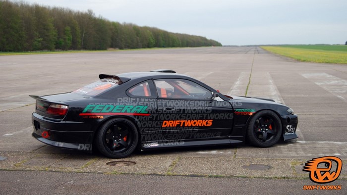 Black Federal Driftworks Nissan Silvia S15 on Racetrack