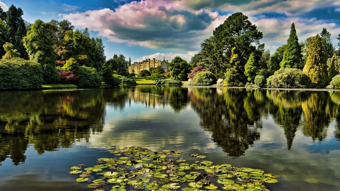 Serene Castle Reflection on Tranquil Lake