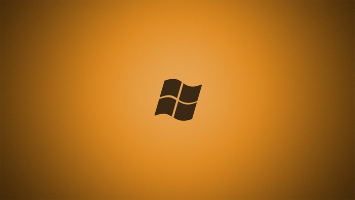 Microsoft Windows logo on orange gradient