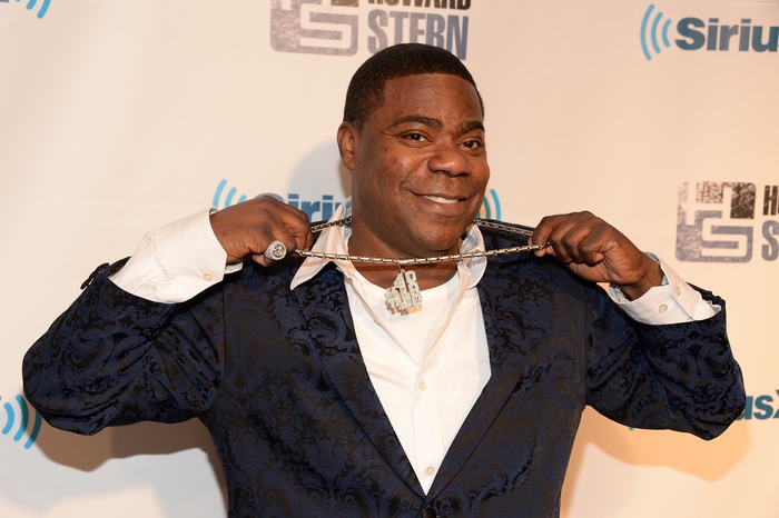 Tracy Morgan wearing a large diamond necklace