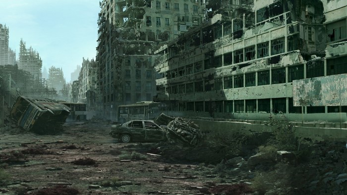 Ruined city street with destroyed buildings and vehicles