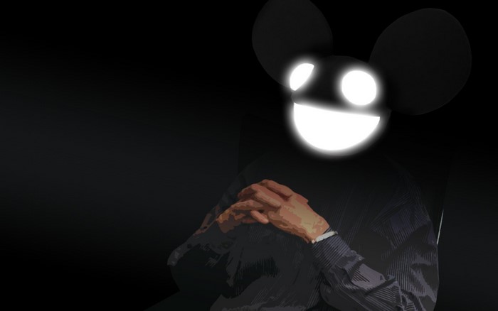 Deadmau5 with glowing face and hands clasped