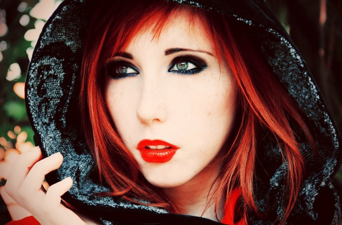 Portrait of a Redhead Woman with Intense Makeup