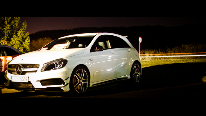 White Mercedes-Benz A-Class parked at night