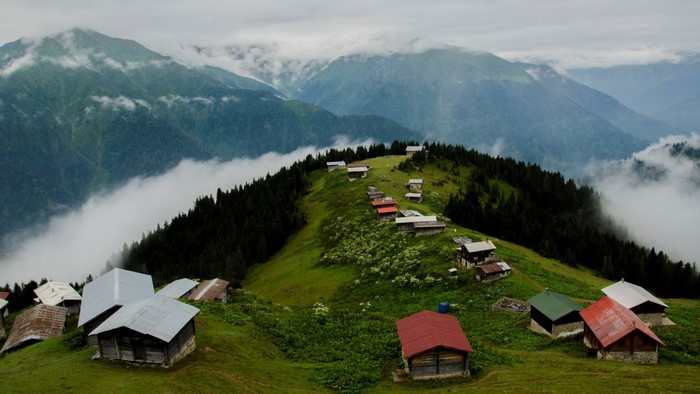 Village on a misty mountain ridge in Turkey