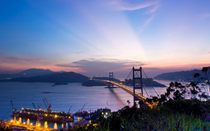 Tsing Ma Bridge at dusk over Hong Kong harbor