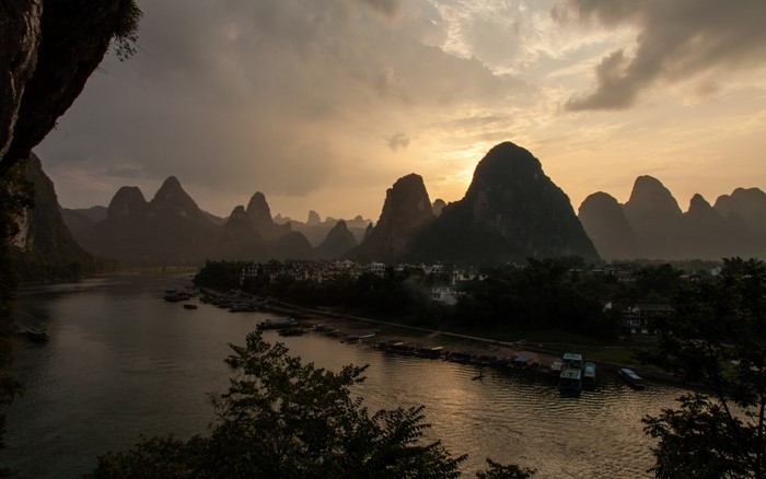 Karst mountains and river at sunset in China