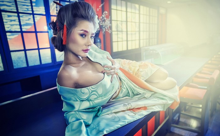 Woman in Geisha Costume Posing on a Bar