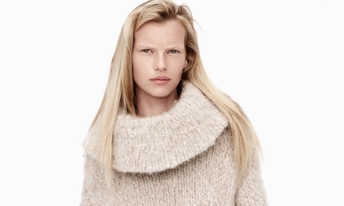 Lina Berg in a knitted sweater
