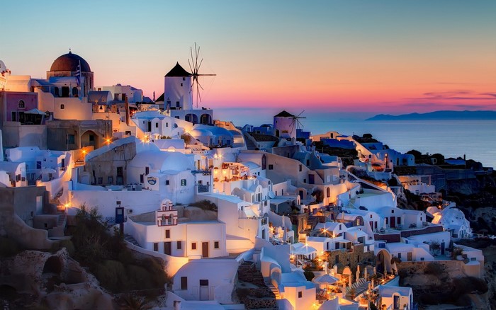 Santorini Greece at Sunset with Windmills and Sea