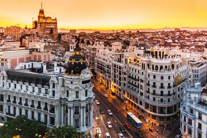 Madrid cityscape at sunset with Gran Via buildings