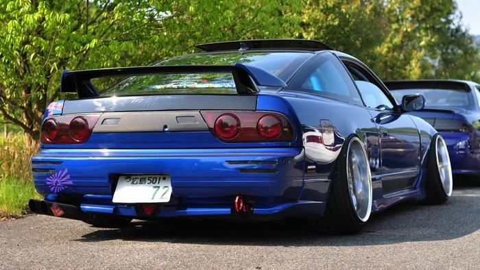 Blue Nissan 200SX sports car with custom modifications