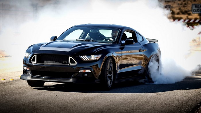 Black Ford Mustang FTR doing a burnout