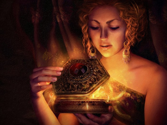 Woman opening a jeweled box with glowing contents