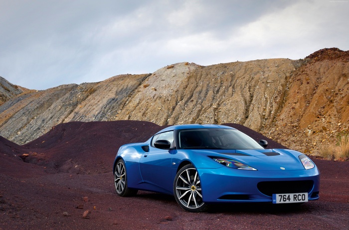 Blue Lotus Evora S sports car on rocky terrain