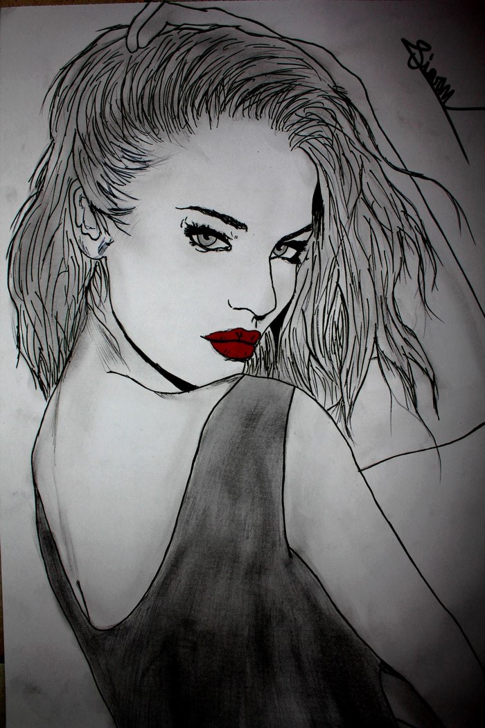 Drawing of a woman with red lipstick