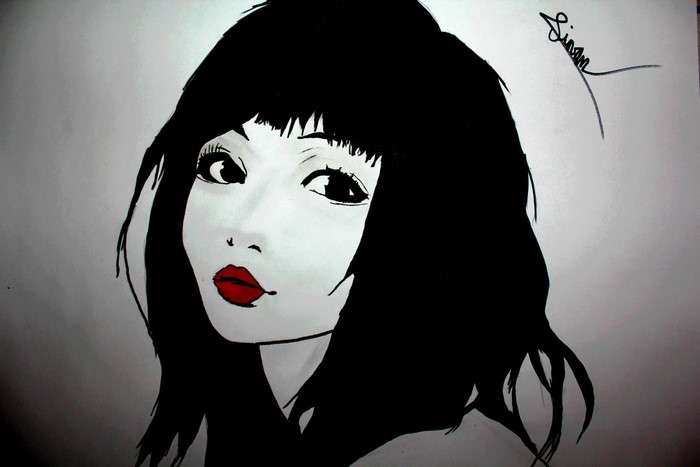 Drawing of a woman with black hair and red lips