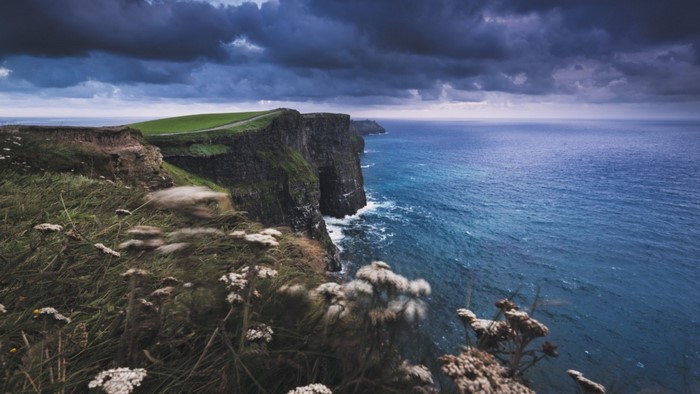 Cliffs of Moher, Ireland, with stormy sea and sky