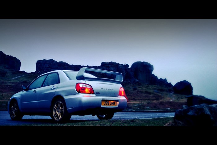 Silver Subaru Impreza WRX STI with large spoiler