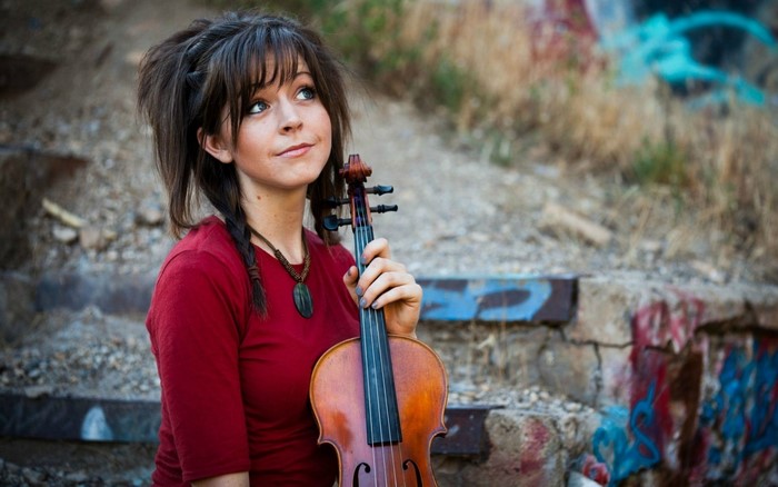 Lindsey Stirling with a violin