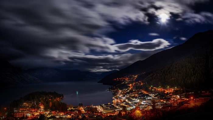 Queenstown, New Zealand at night under moonlight