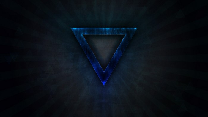 Blue triangle symbol on dark background