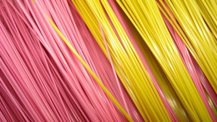 Pink and yellow strands in a pattern