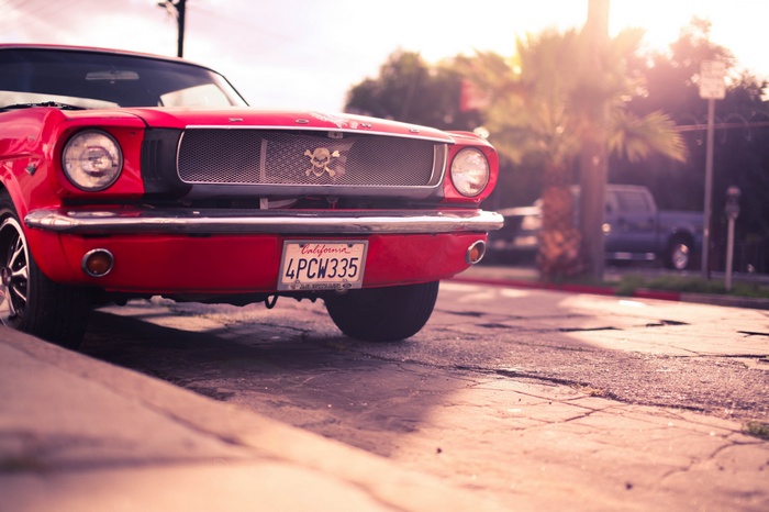 Red Ford Mustang with California License Plate
