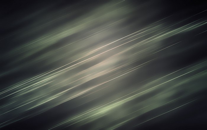 Abstract diagonal light streaks on dark background