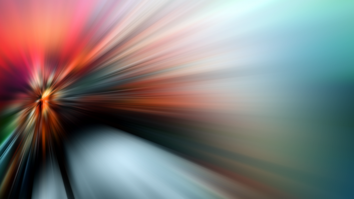 Abstract light burst with red, orange, and blue colors