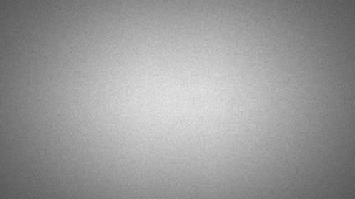 Monochrome textured surface with gradient lighting