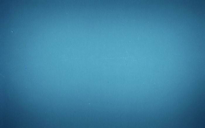 Blue textured background with subtle lens flare