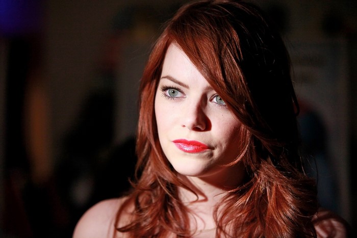 Emma Stone portrait with red hair and red lipstick