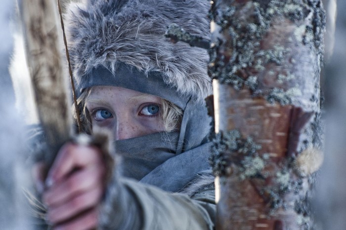 Saoirse Ronan as Hanna with a bow and arrow in winter
