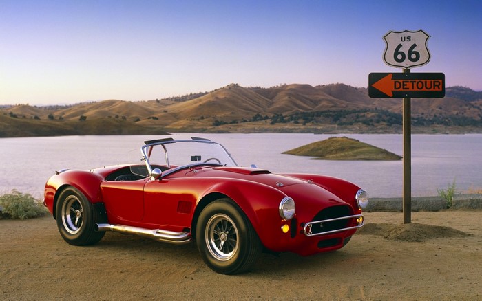 Red Shelby Cobra 427 convertible on Route 66
