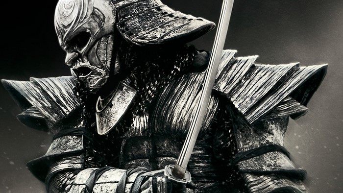 Samurai warrior in armor holding a sword