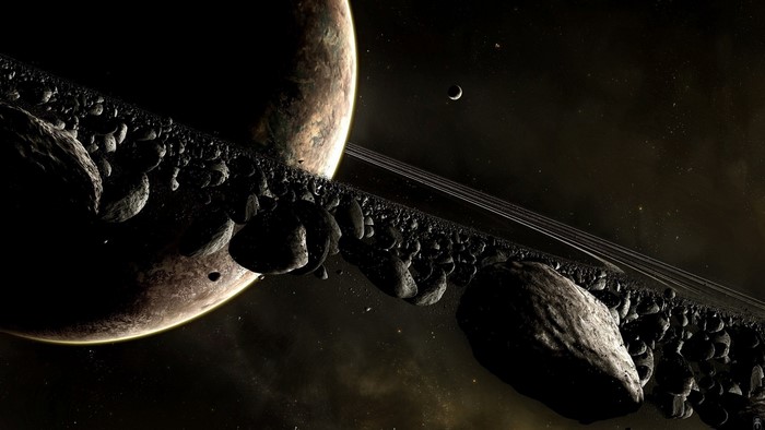 Planet with asteroid ring and moon in space