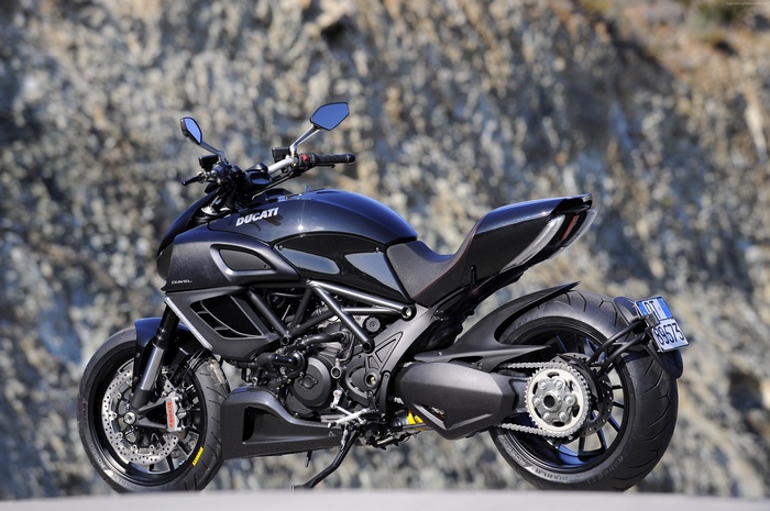 Black Ducati Diavel motorcycle parked outdoors