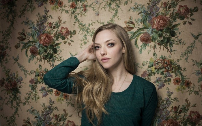 Amanda Seyfried portrait with floral wallpaper