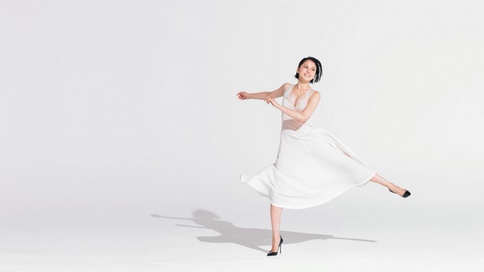 Masami Nagasawa in a white dress dancing