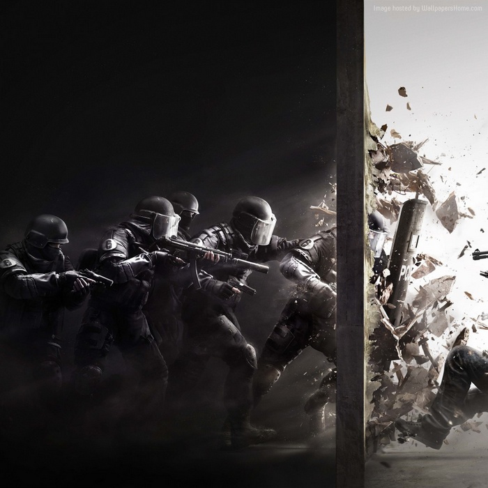 Rainbow Six Siege tactical operators breaching a wall
