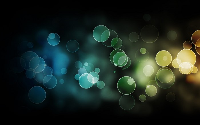 Bokeh lights in blue, green, and yellow