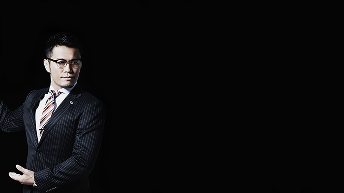 Genki Sudo from World Order wearing a suit