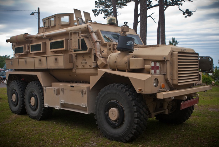 USMC Cougar HE MRAP vehicle with red cross