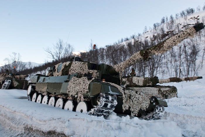 Leopard 2 tanks in snowy Norwegian forest