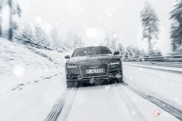 Audi A7 driving in a snowstorm