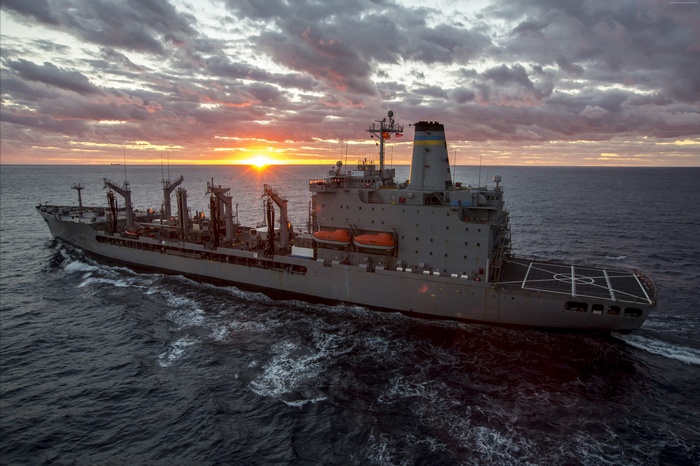 USNS John Lenthall (T-AO 189) sailing at sunset