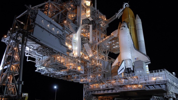 Space Shuttle on Launch Pad at Night